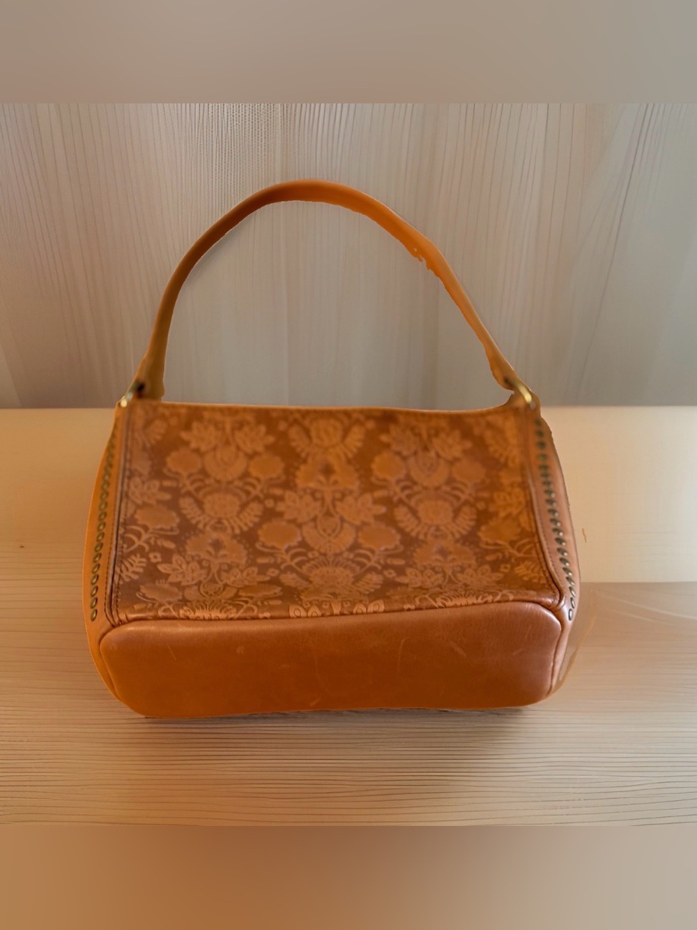 The Sak Indio Leather Demi Bucket Shoulder Bag Tobacco Floral Embossed Tooled